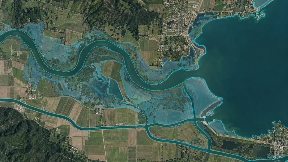 Satellite water scene with river, shoreline, canal, and flood boundaries